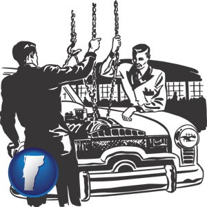 auto mechanics hoisting an engine out of a car with chains - with Vermont icon