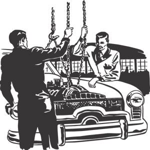 auto mechanics hoisting an engine out of a car with chains